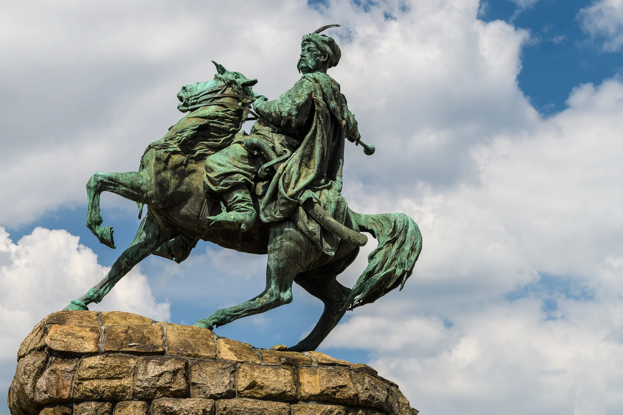 Bohdan Khmelnytsky equestrian monument beneath clouds in Kyiv Ukraine