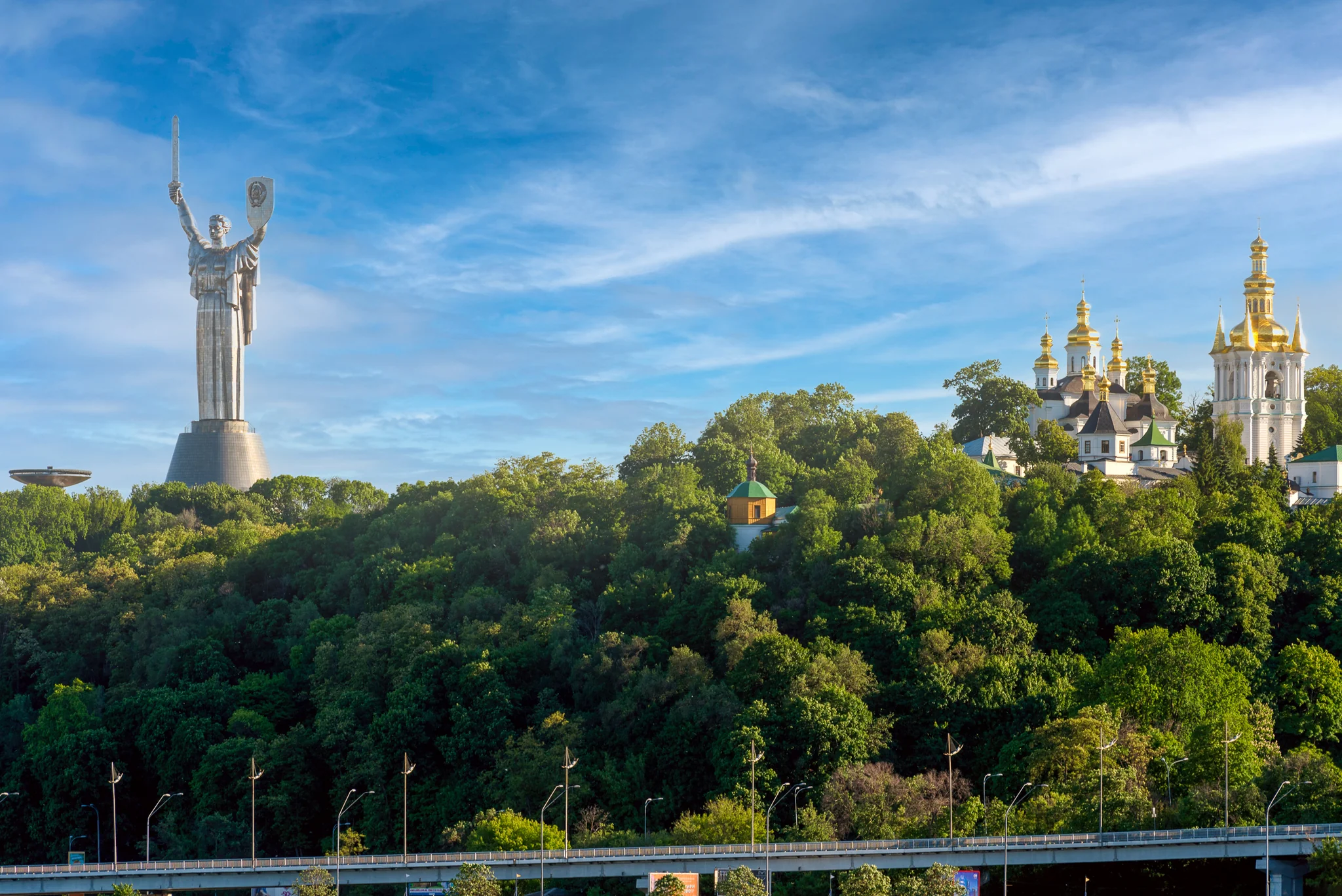 Motherland Monument and golden domes of Kyiv Pechersk Lavra in Kyiv Ukraine