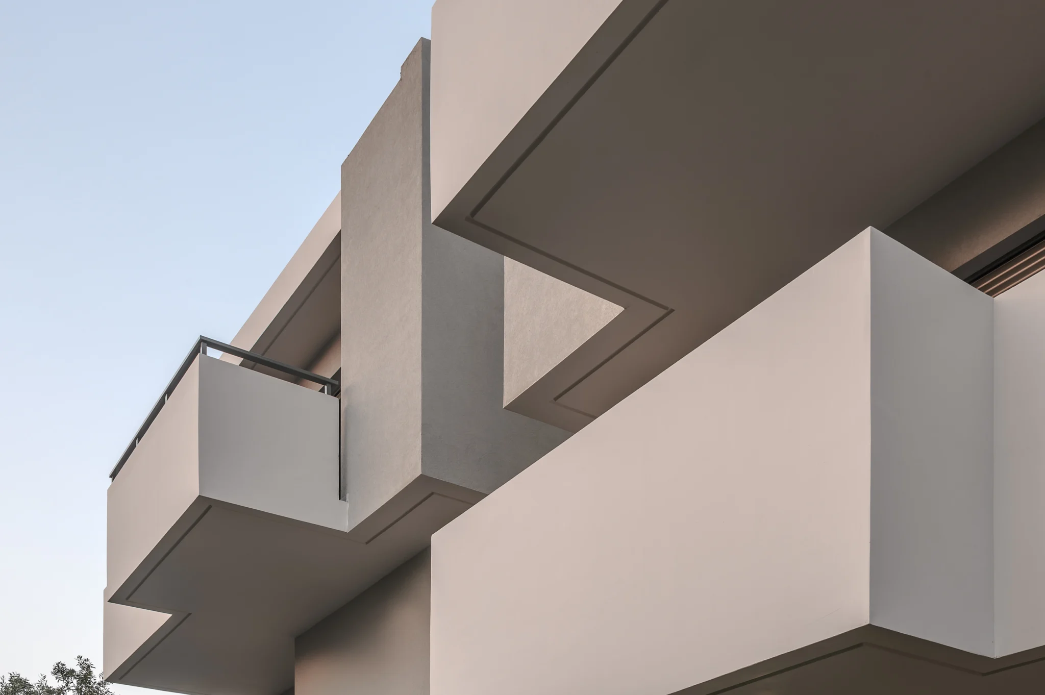 Projecting white balconies viewed from below at Residential Complex in Athens, Athens, Attica, Greece.