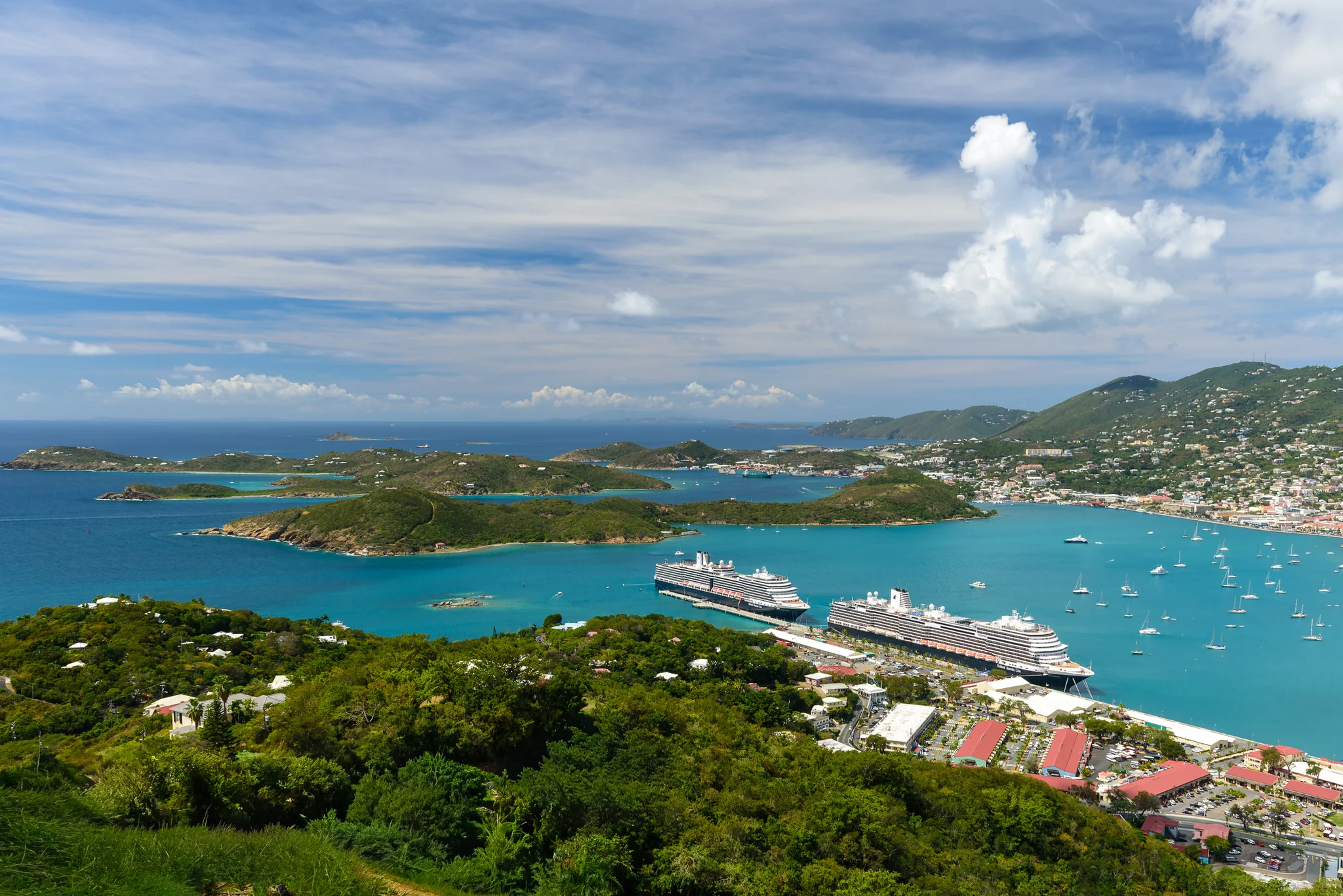Island Harbor With Cruise Ships Elevated view of an island harbor with cruise ships and blue bays